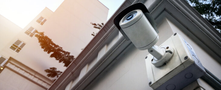 CCTV Security camera on building wall.