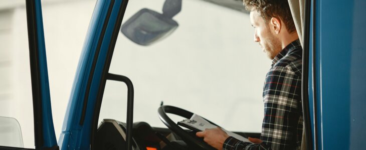 truck driver reviewing log