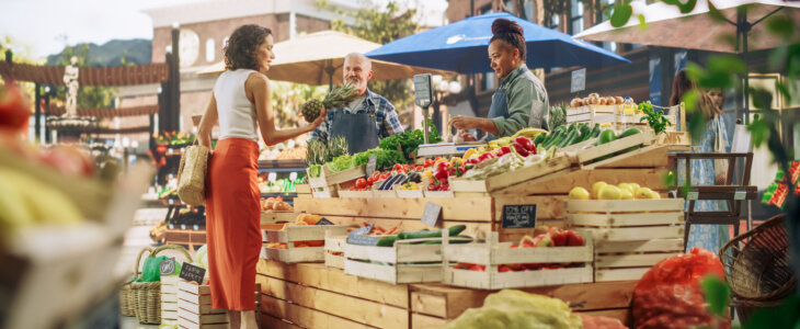 woman at summer pop-up event buying fruit