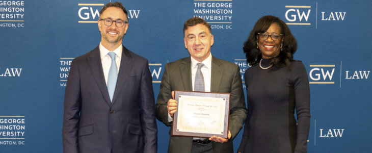 Thomas simeone receiving honor from George Washington University