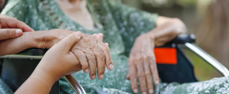 holding elder's hand