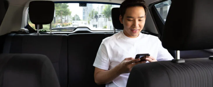 man in backseat