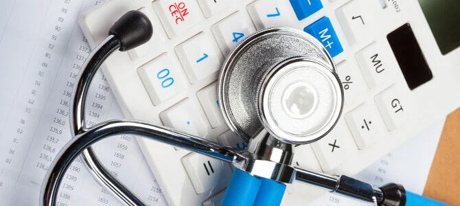 calculator with stethoscope
