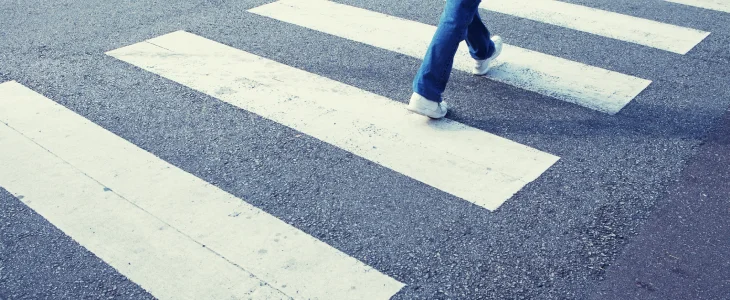 Pedestrian crossing over the crosswalk