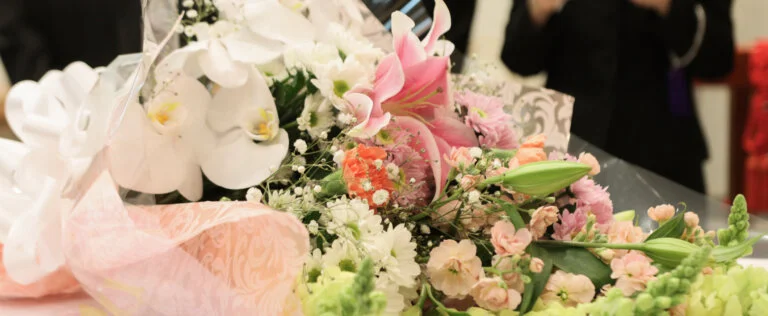 bouquet on the coffin while Funeral ceremony in Japan