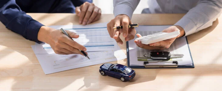 auto insurer with client