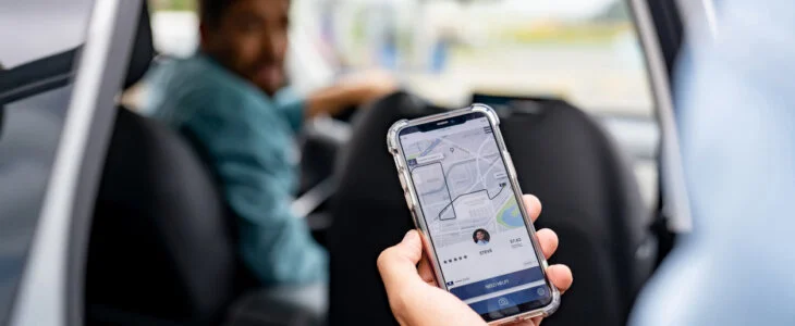 uber passenger entering the car